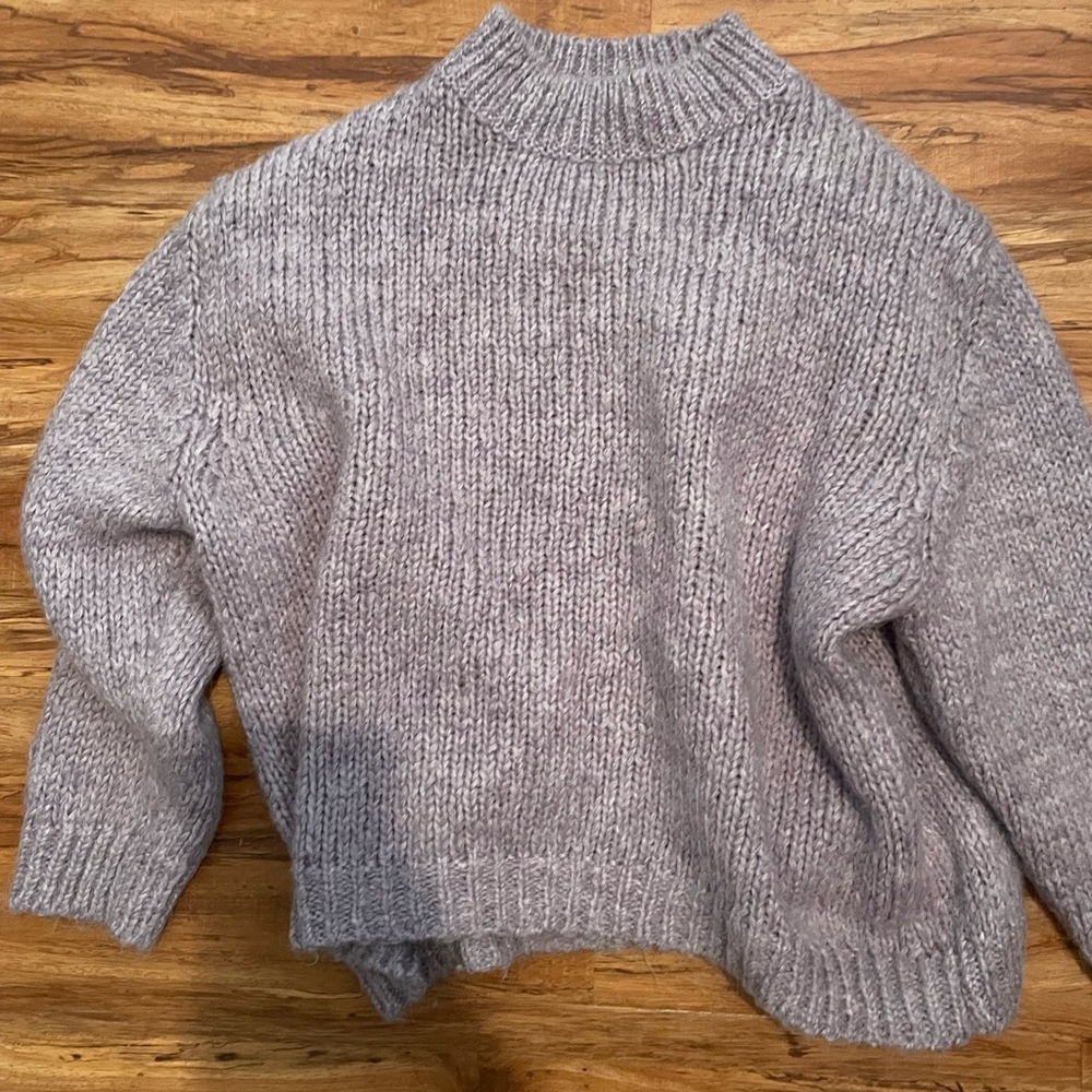 Lilac sweater a lot lighter in person